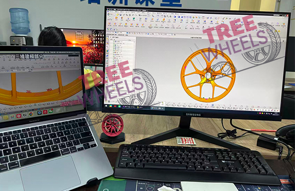 designer sketching wheel concepts