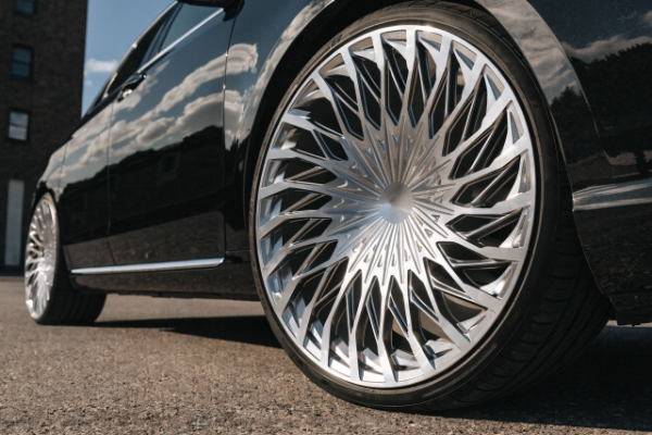 silver wheels on black car