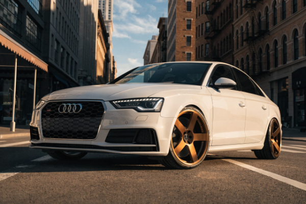 Bronze forged wheels on white Audi S4