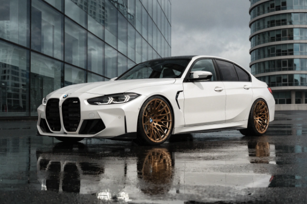 white BMW M3 with custom wheels