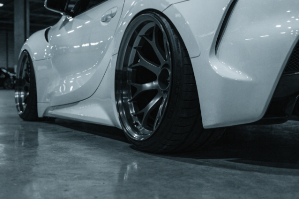 Dark wheels on white Toyota Supra MK5