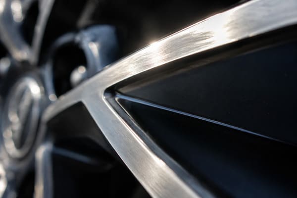 Diamond-Cut Wheel Sharp Edge Detail Close-up of diamond-cut wheel edge showing mirror aluminum and dark recess contrast