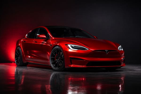 Red Tesla Model S Plaid with custom forged wheels