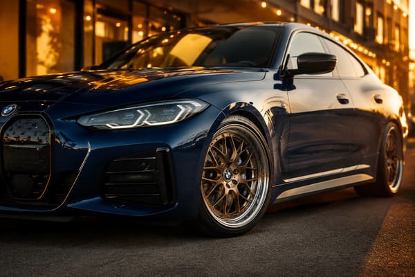 Gold or Bronze Wheels on Blue BMW i4\ Bronze gold forged wheels on blue BMW i4 bold contrast